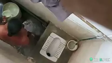 XXX clip of village aunty taking bath in outdoor taken on her son