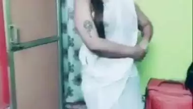 Desi girl in transparent sari dances and sings in short TikTok video