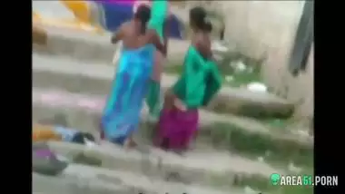 Local guy caught sexy Indian aunts take a bath outdoor in the river. era desi